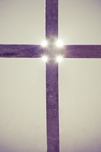 glow of light on a cross