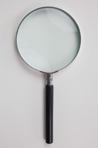 magnifying glass on white 