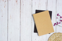 notebooks on white wood background 