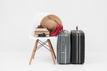 books, shoes, hat, camera, trip, travel, vacation, suitcases, luggage, white background 