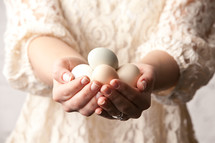 woman holding eggs
