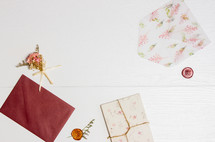 flowers, stationary and envelopes on a white background 
