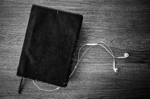 Bible and earbuds 