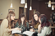 Women at a coffee shop during a Bible study.