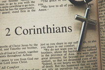 2 Corinthians and a cross necklace  