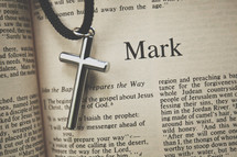 mark and a cross necklace 