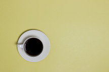 coffee cup on a yellow background 