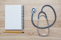 stethoscope and notebook 