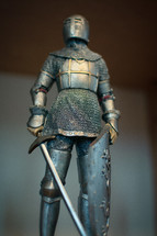 Knight in armor, with sword and shield