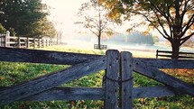 a lock around a gate on a ranch in fall 
