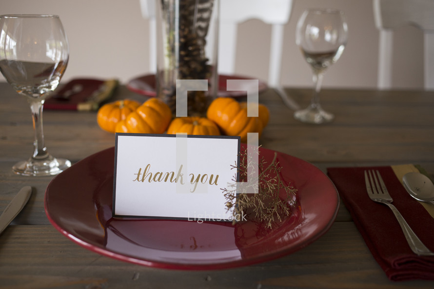 Thank You card on a red plate for Thanksgiving 