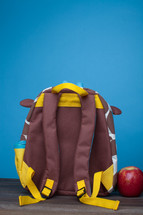 school book bag and apple 