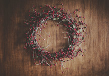 a simple wreath on wood