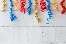 party ribbons on white board