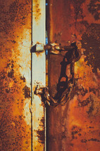a rusty door and lock 