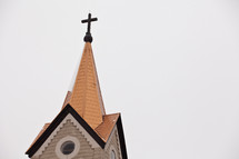 Church steeple with cross.