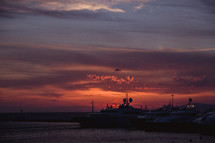 docked boats at sunset 