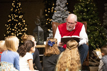 reading Christmas stories to Children 