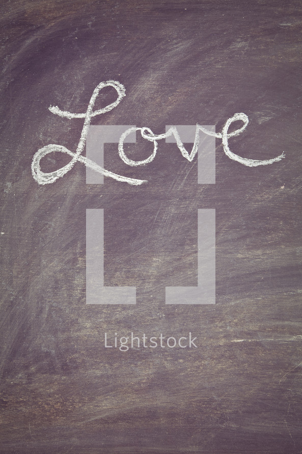 Love written on a chalkboard 