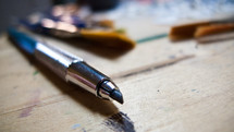 an artists tools and paint brushes