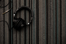 headphones on a rug 