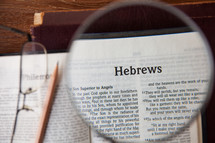 magnifying glass over Hebrews 