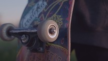 Skater rolling wheel on skateboard