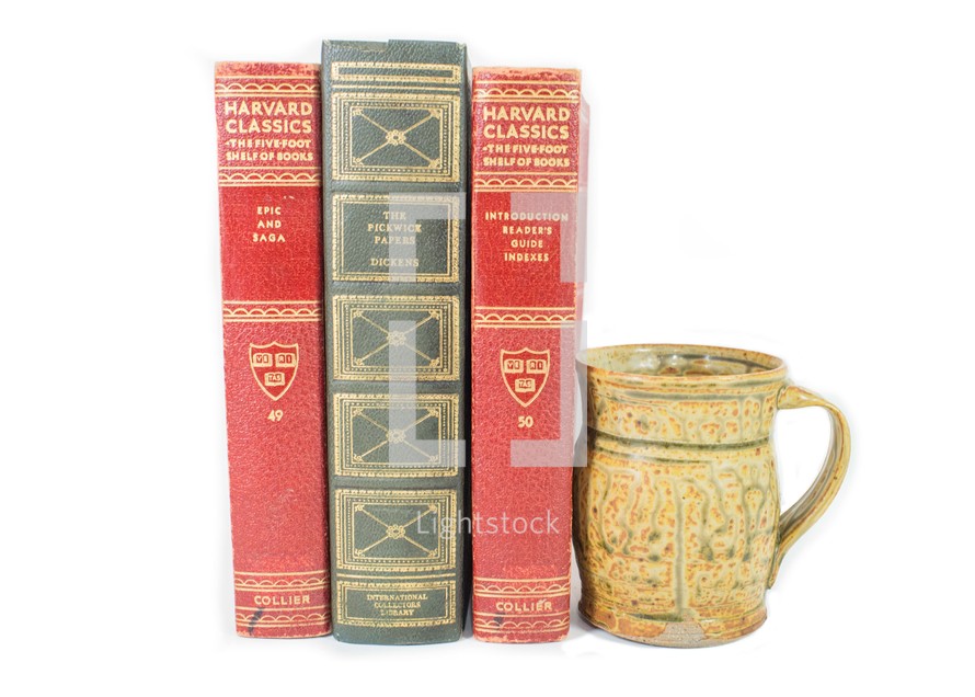 vintage books and pottery mug 