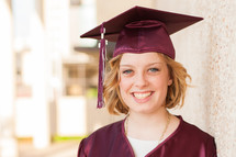 Graduating girl smiling.