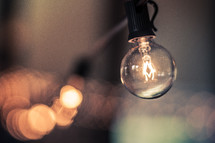 Light bulb with bokeh background