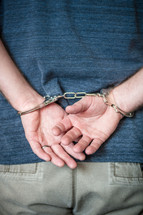 a handcuffed man 