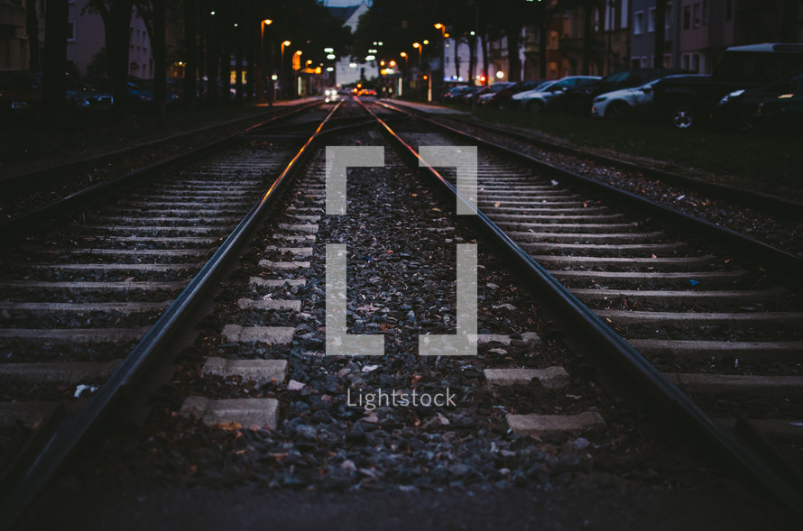 railroad tracks at night 