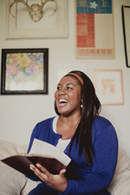 African-American woman reading a Bible 