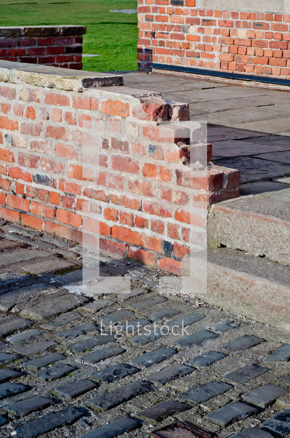broken red brick wall 