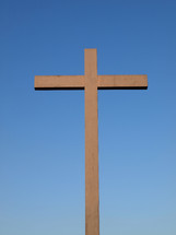 Christian cross over a blue sky background