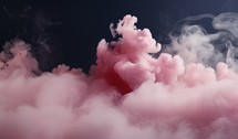 Cloud of pink smoke on a black background.