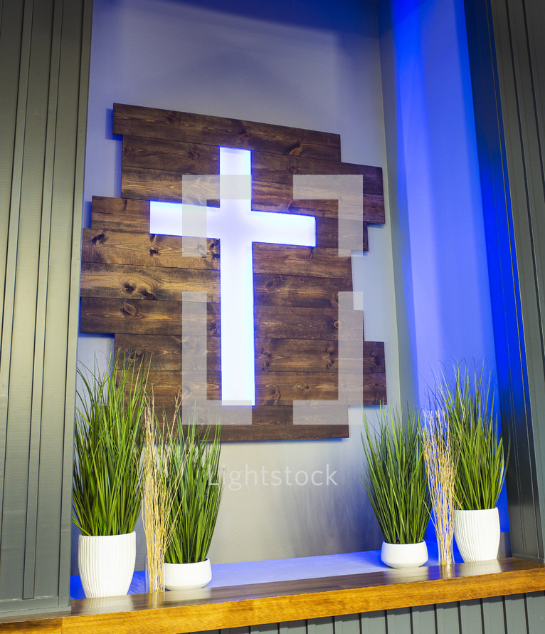 illuminated cross on an altar 