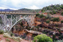 red rock canyon landscape with bridge 