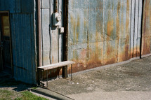 rusty metal walls of a warehouse building 