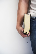 man holding a Bible at his side 