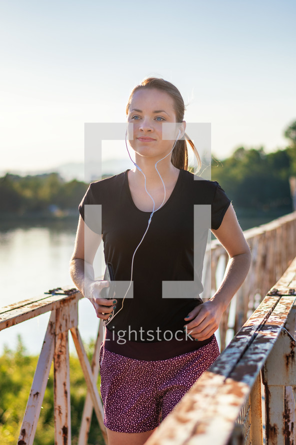 jogger with earbuds 