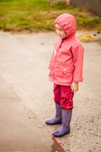 child in rain gear 