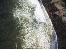 aerial view over ocean surf 