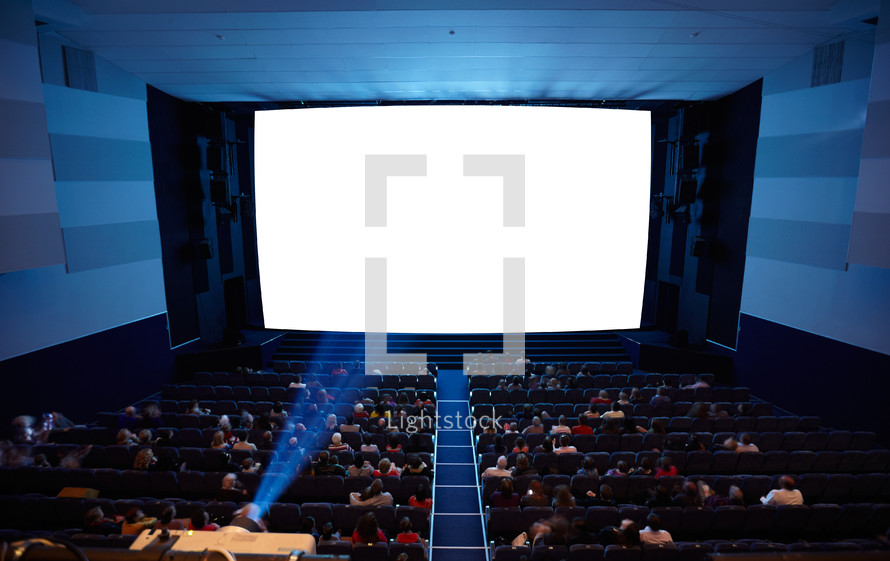 Cinema auditorium with light of projector