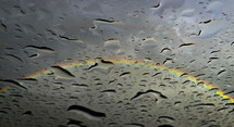 water on glass and rainbow 