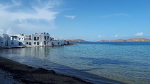 view of white buildings on an island in Greece 