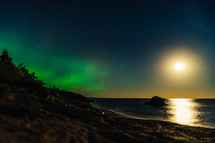 Aurora Borealis over a shore 