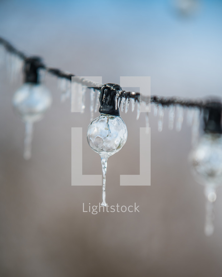 Frozen light bulbs with icicles 