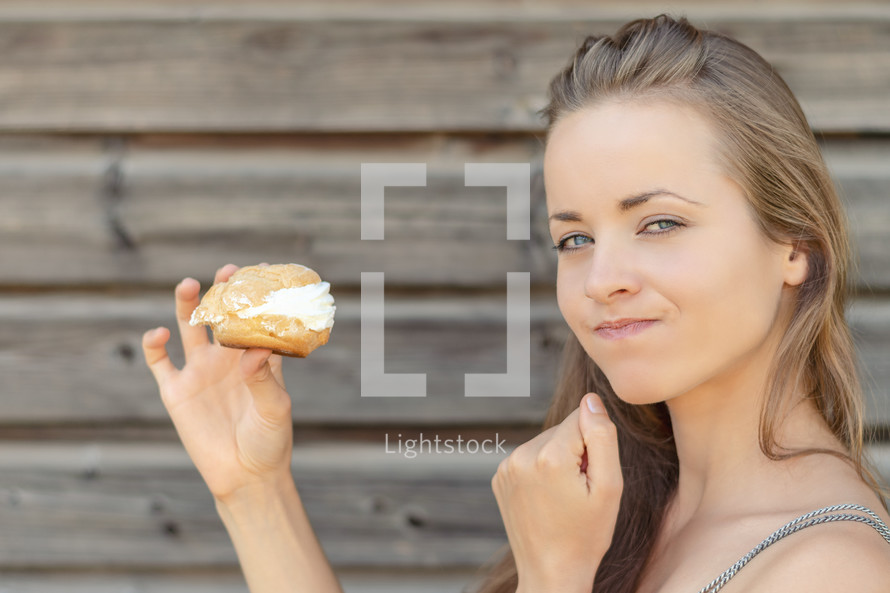 a woman eating sweets 