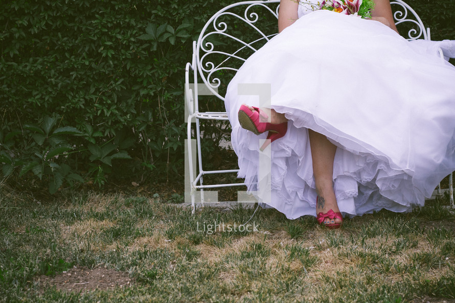 fuchsia pink shoes on a bride